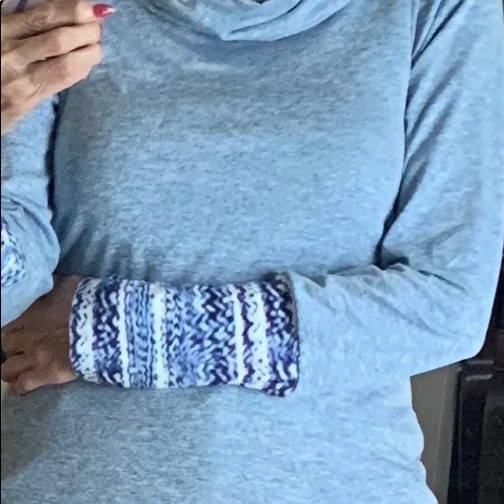 Pretty soft blue pullover top with cowl neck.